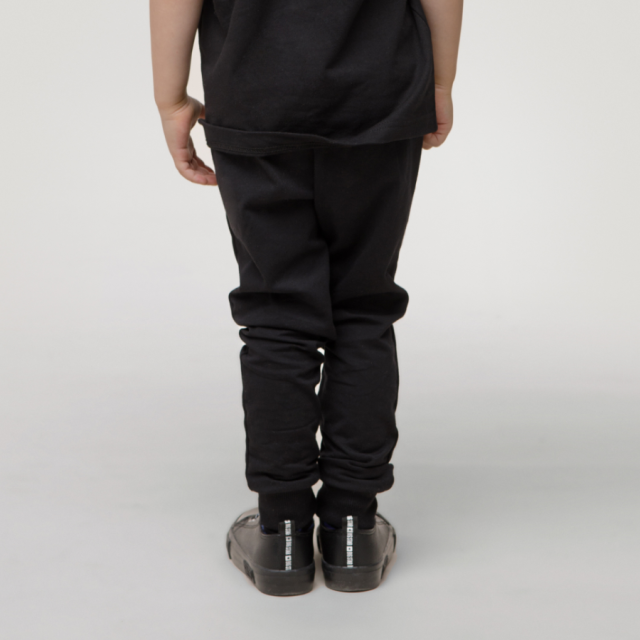 Czarne spodnie dresowe dla dzieci i niemowląt - Let's Rock | Pinokio