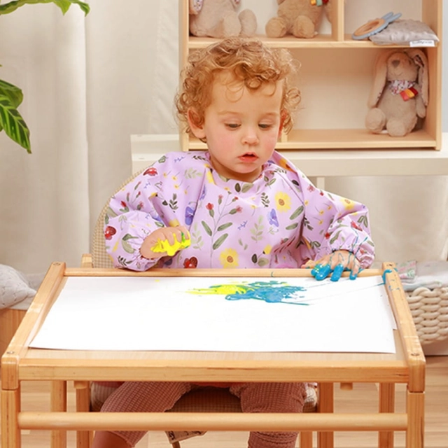 Śliniak zmywalny z długim rękawem Garden BabyOno